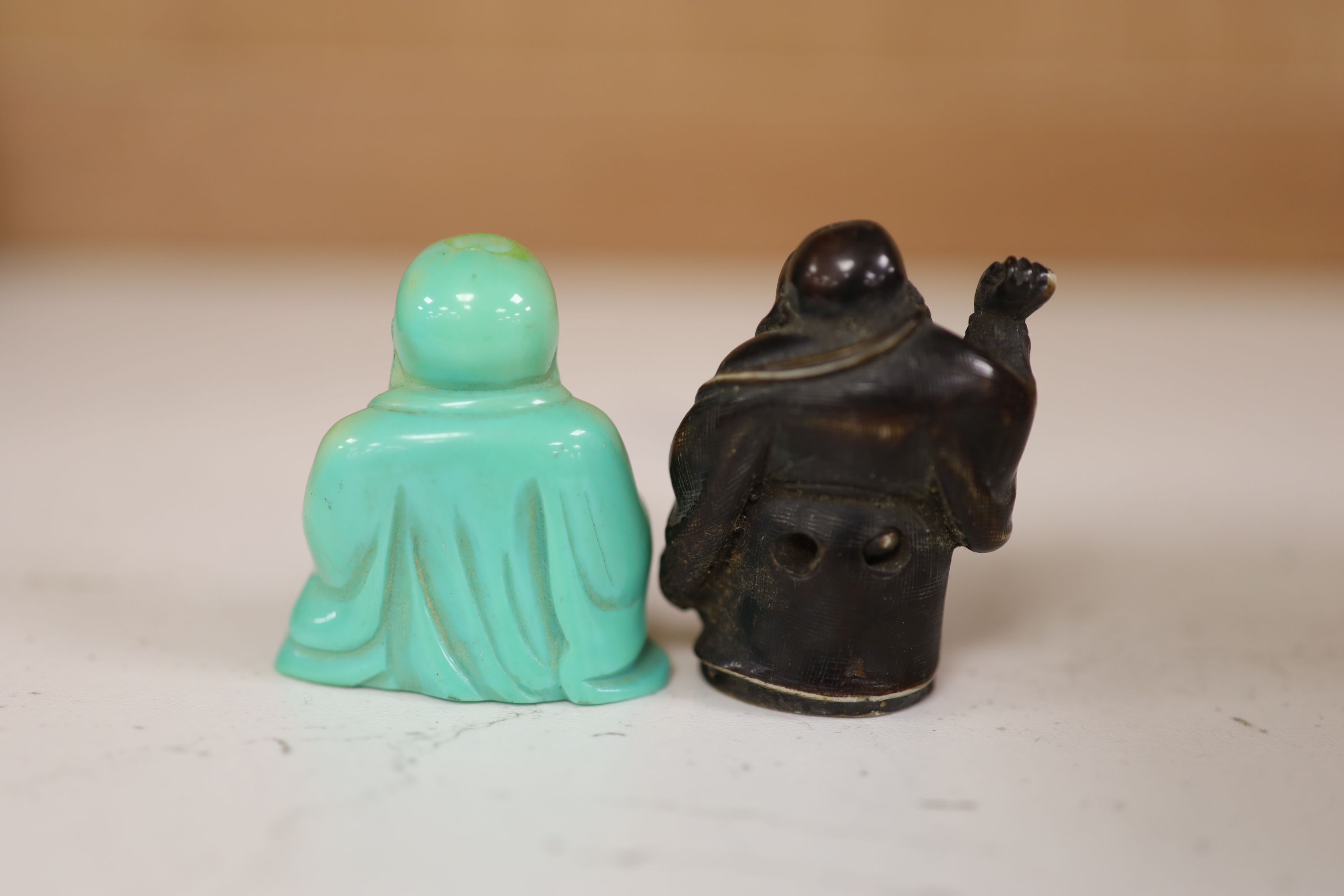 A small miscellaneous Oriental collection including enamel snuff boxes, Buddha carvings etc.